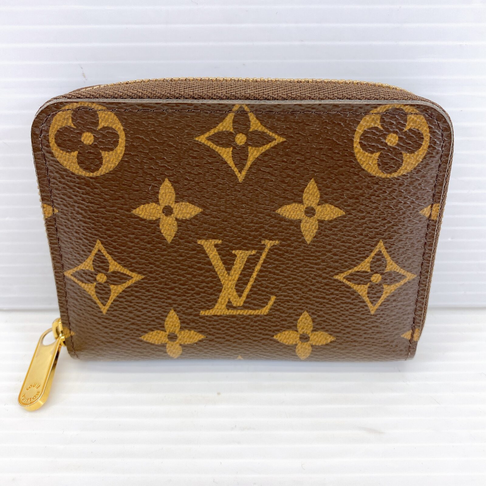 LOUIS VUITTON ジッピーコインパース モノグラム M60067を買取させて