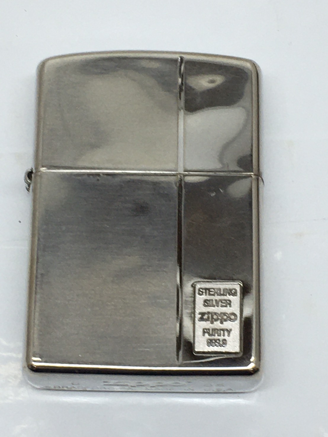 ZippoSTERLING SILVER PURITY 999.9